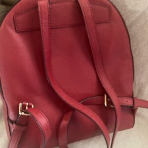 Red Michael kors leather back pack bag